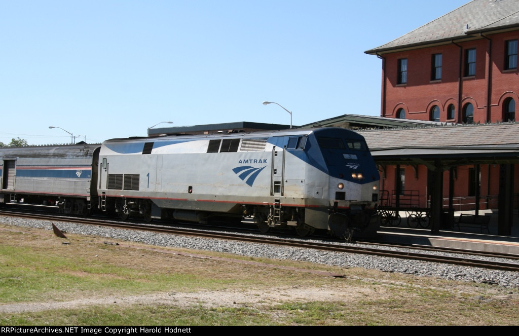 AMTK 1 brings train P080 into the station